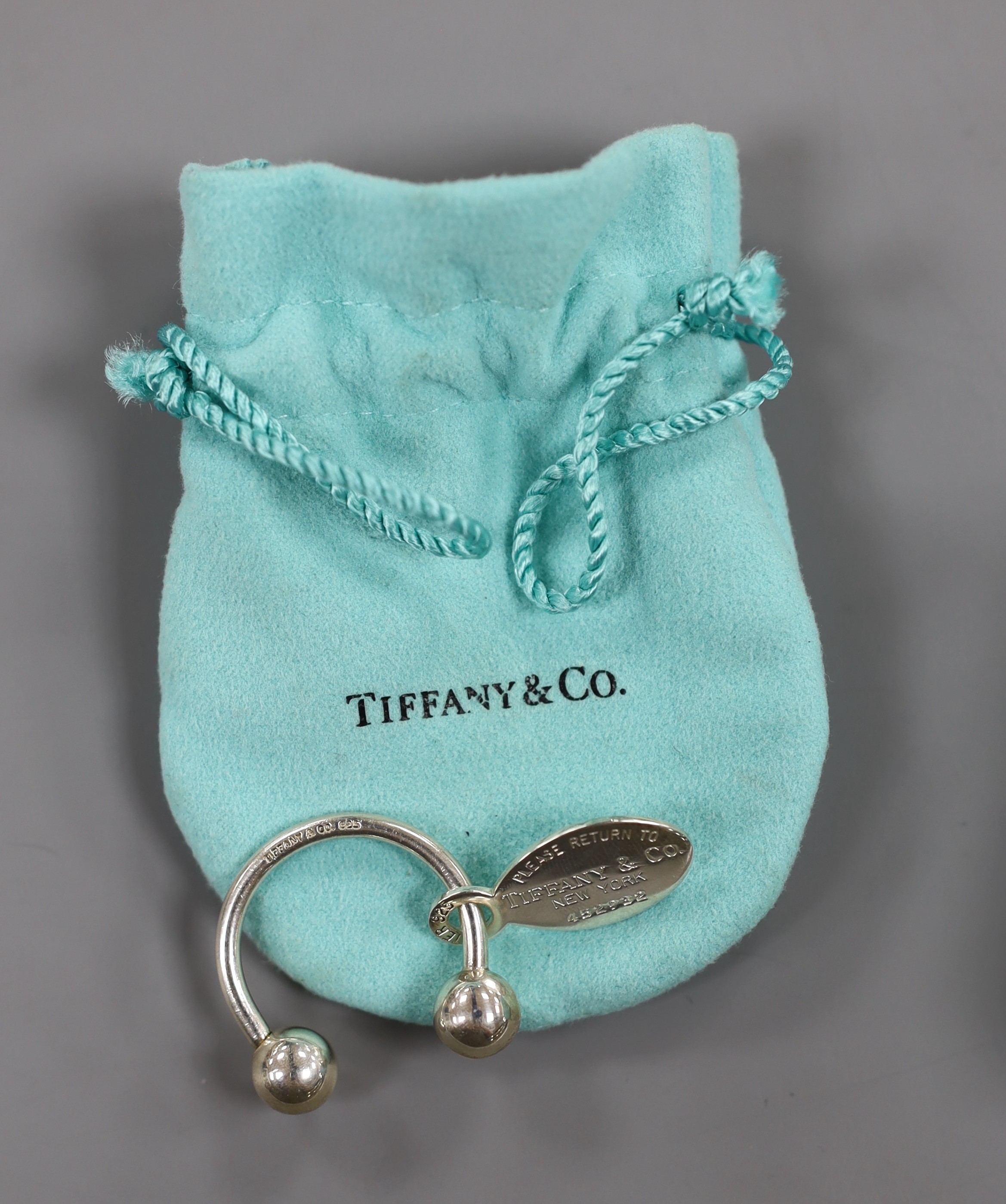 A modern Tiffany & Co sterling 925 keyring, 27mm, with pouch and box.